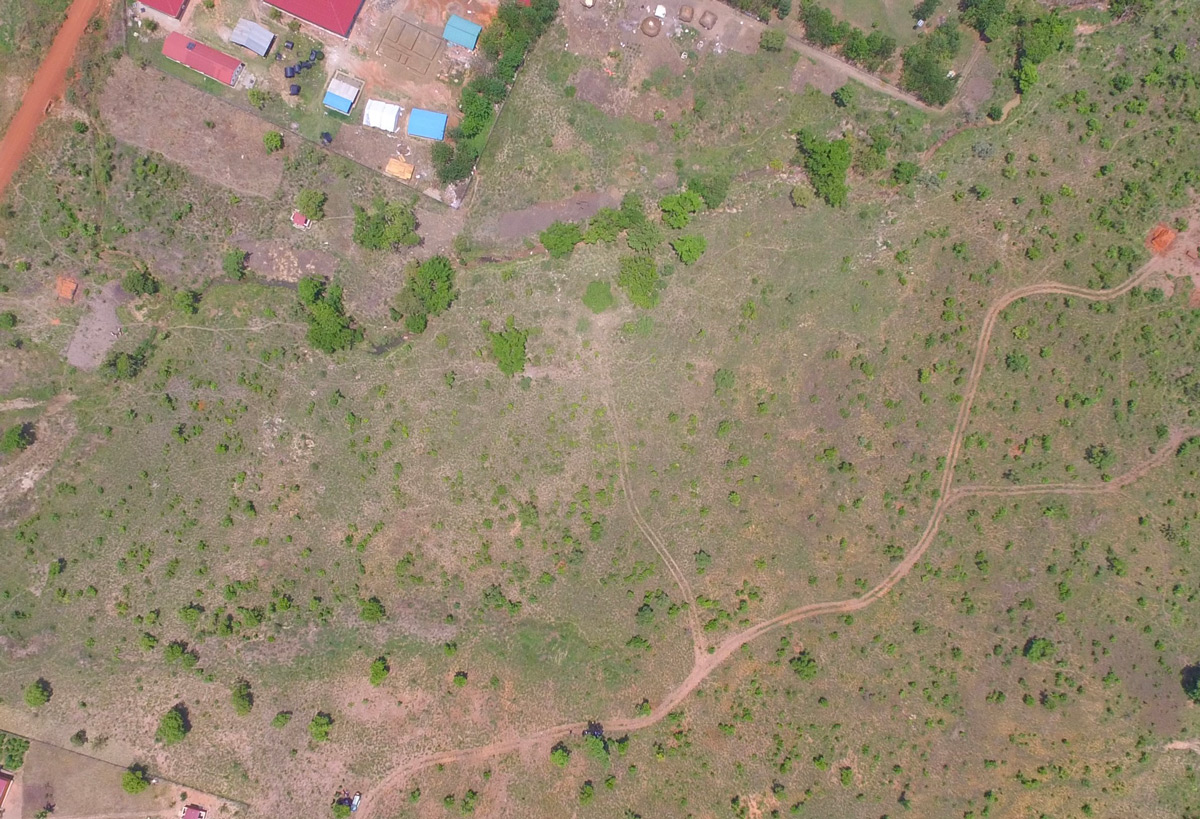 aerial view of Lok Neno demonstration area with few buildings and little biodiversity and plant life